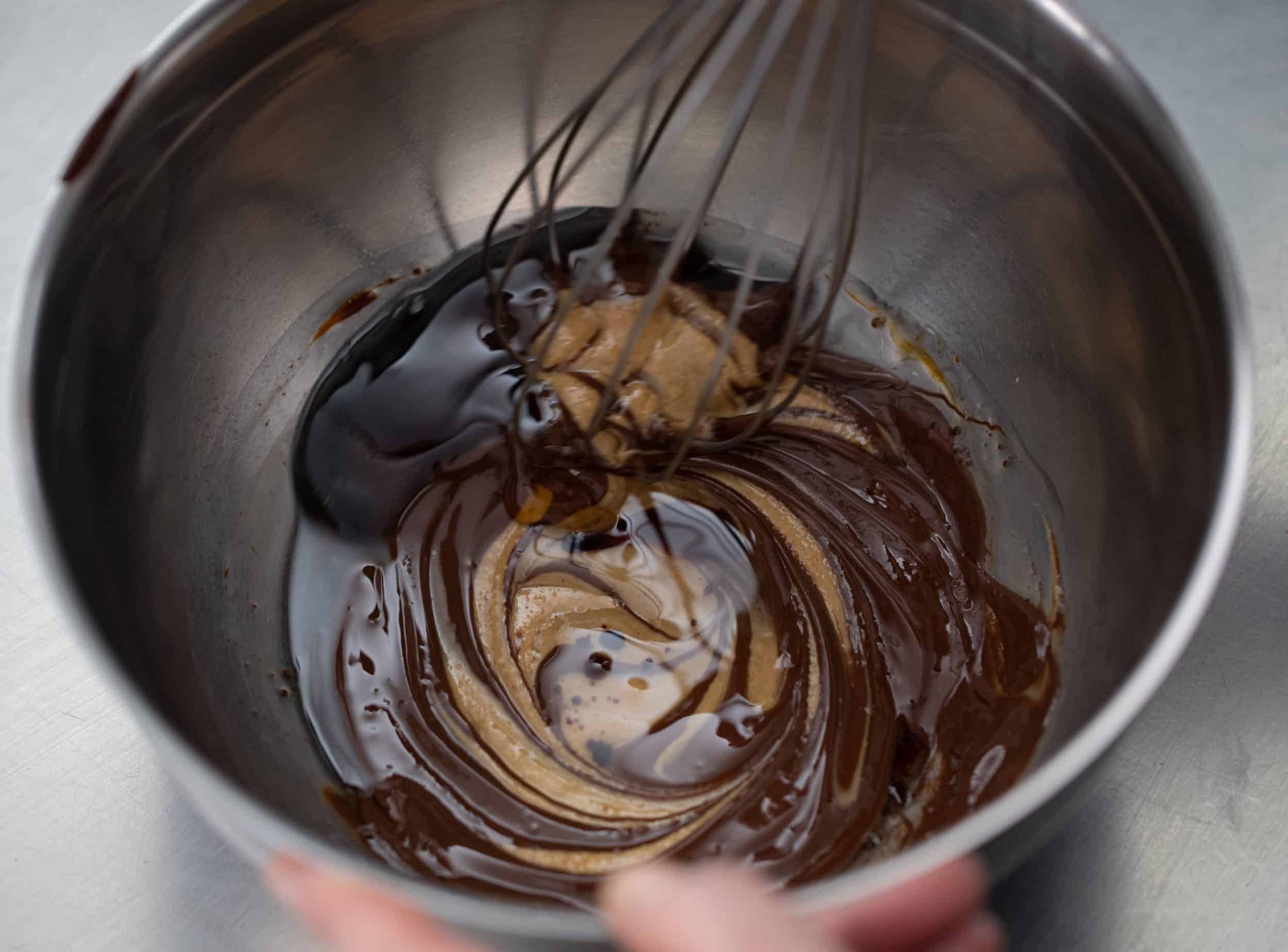 Whisking together all peanut truffle ingredients